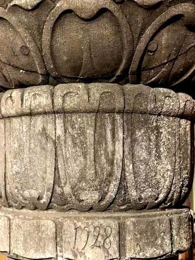 Detail of carved wood lotus form Buddha pedestal with patina
