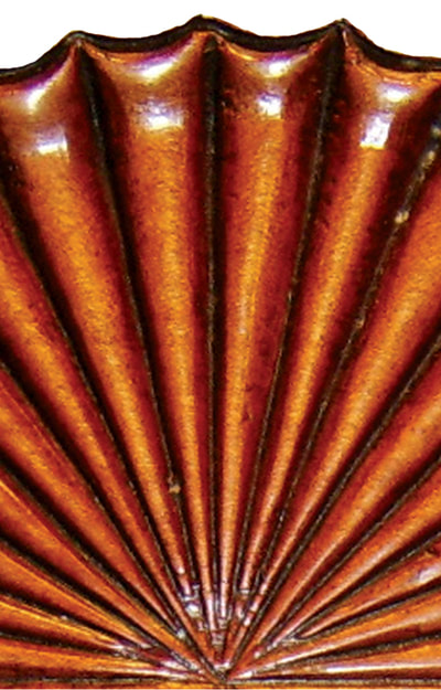 Detail of a fan carving from an 18th century highboy made in Massachusetts